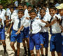 school children dressed uniform have fun play schoolyard 90x80